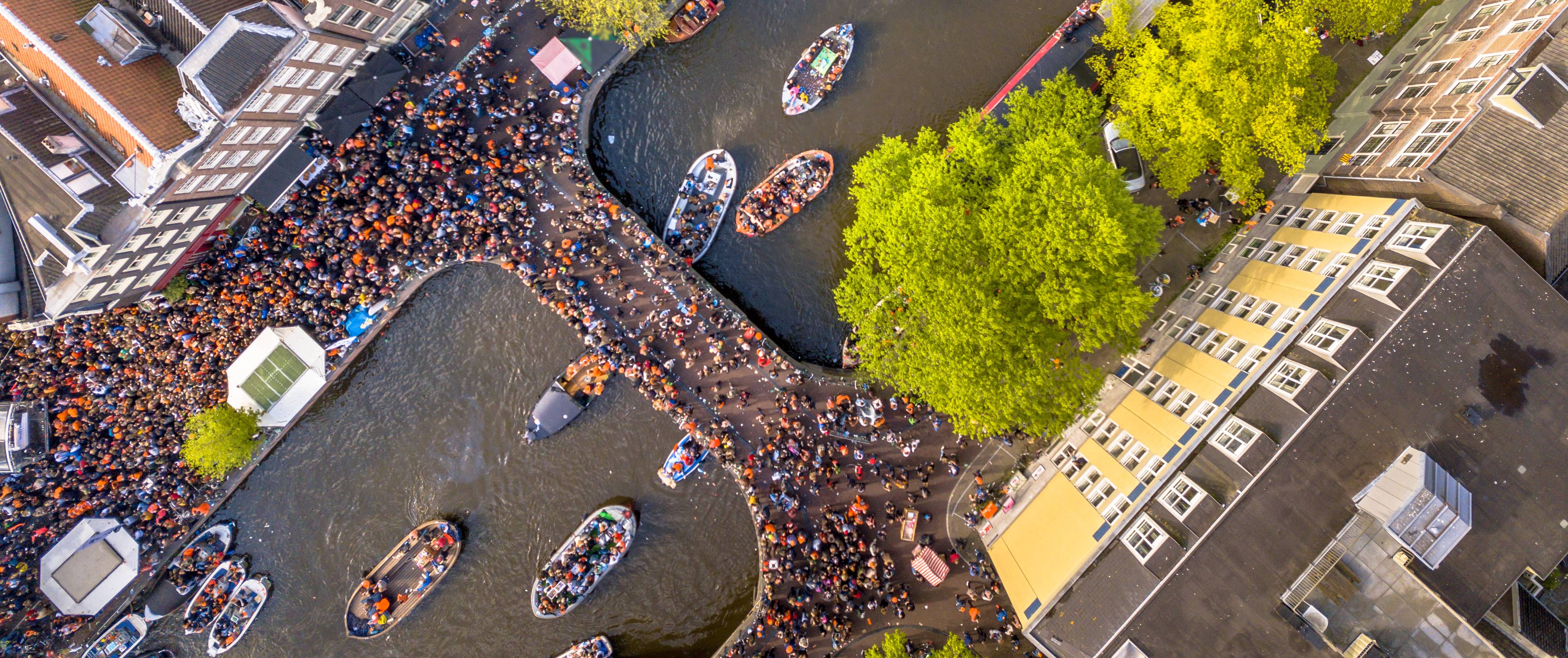 Vibrant Amsterdam — aerial view of a bustling event